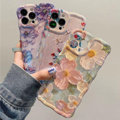 "Stylish Retro Oil Painting Flower Case for iPhone 11–16 Pro Max | Glossy Floral Cover with Exquisite Wave Border"